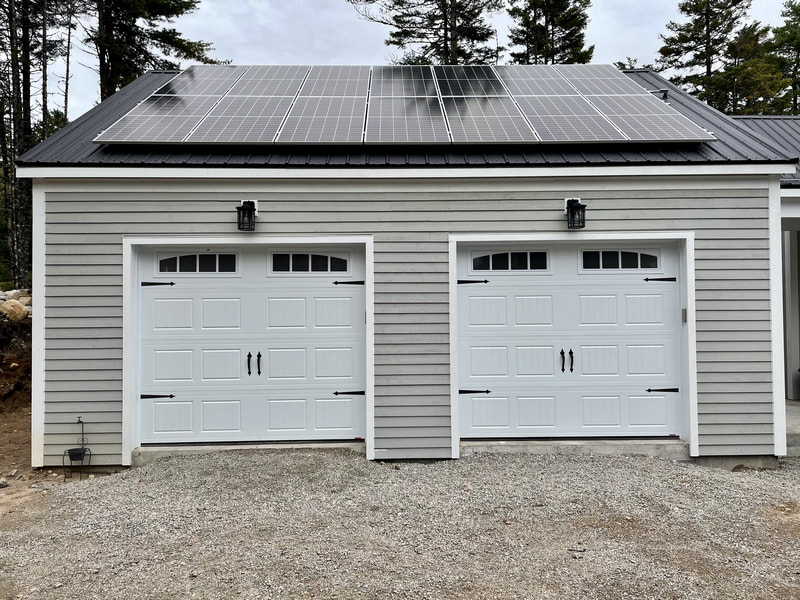 Detached double car garage with solar panels